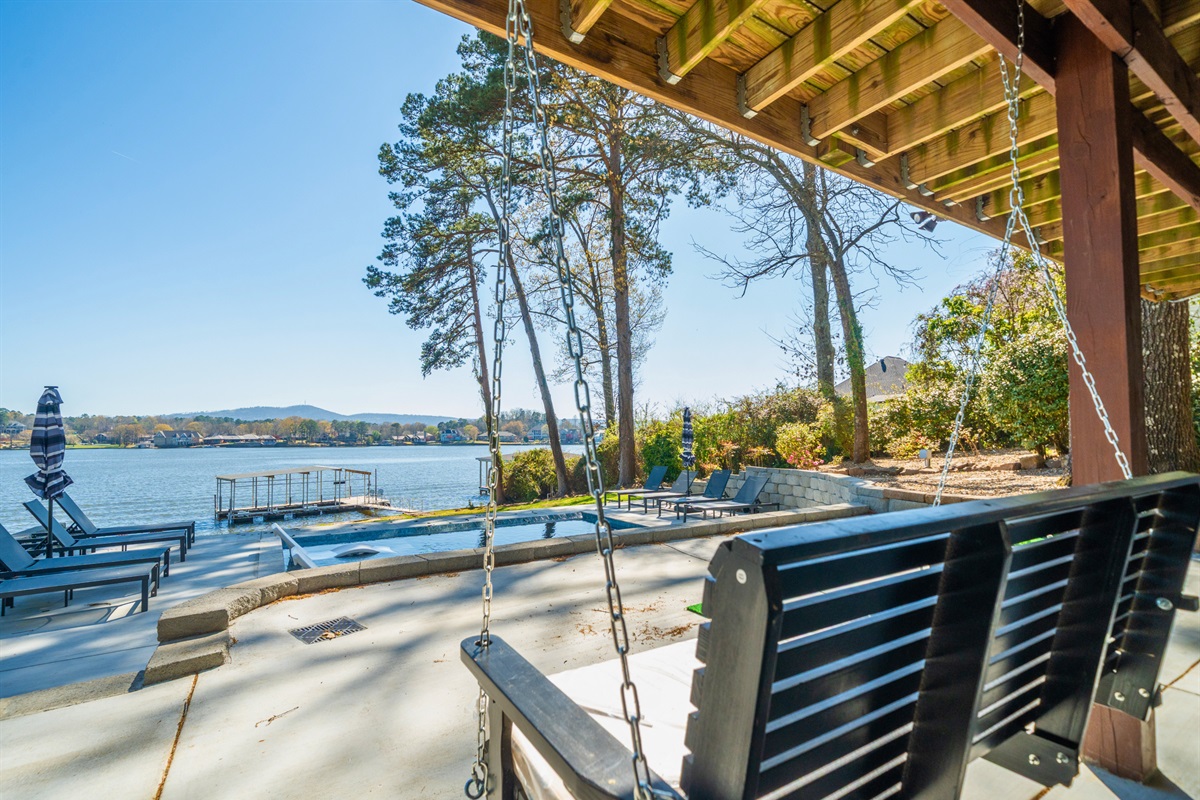 Spend the day poolside with plenty of seating options and a scenic setting that makes it easy to relax for hours.