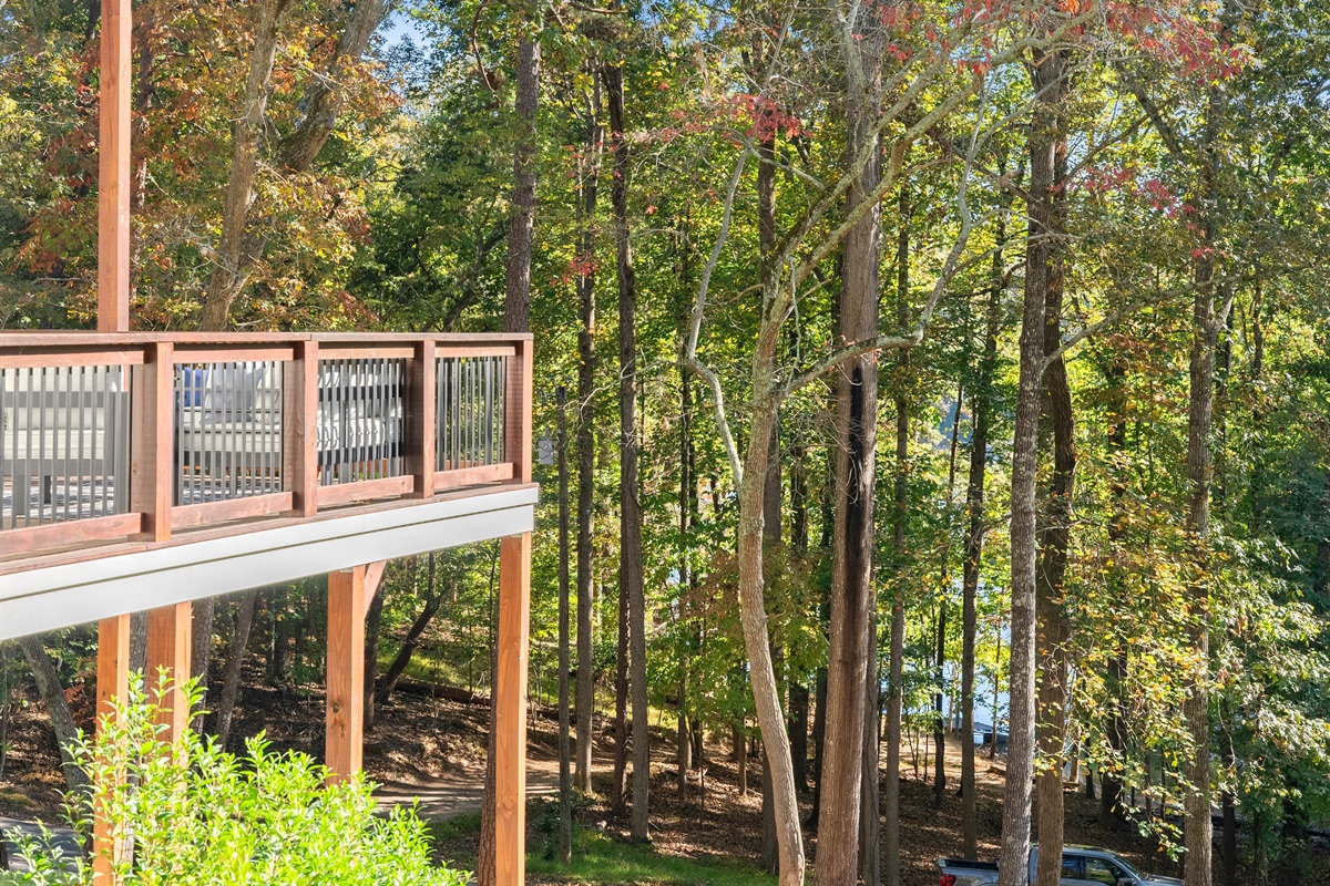Multi-level decks with peaceful lake views.