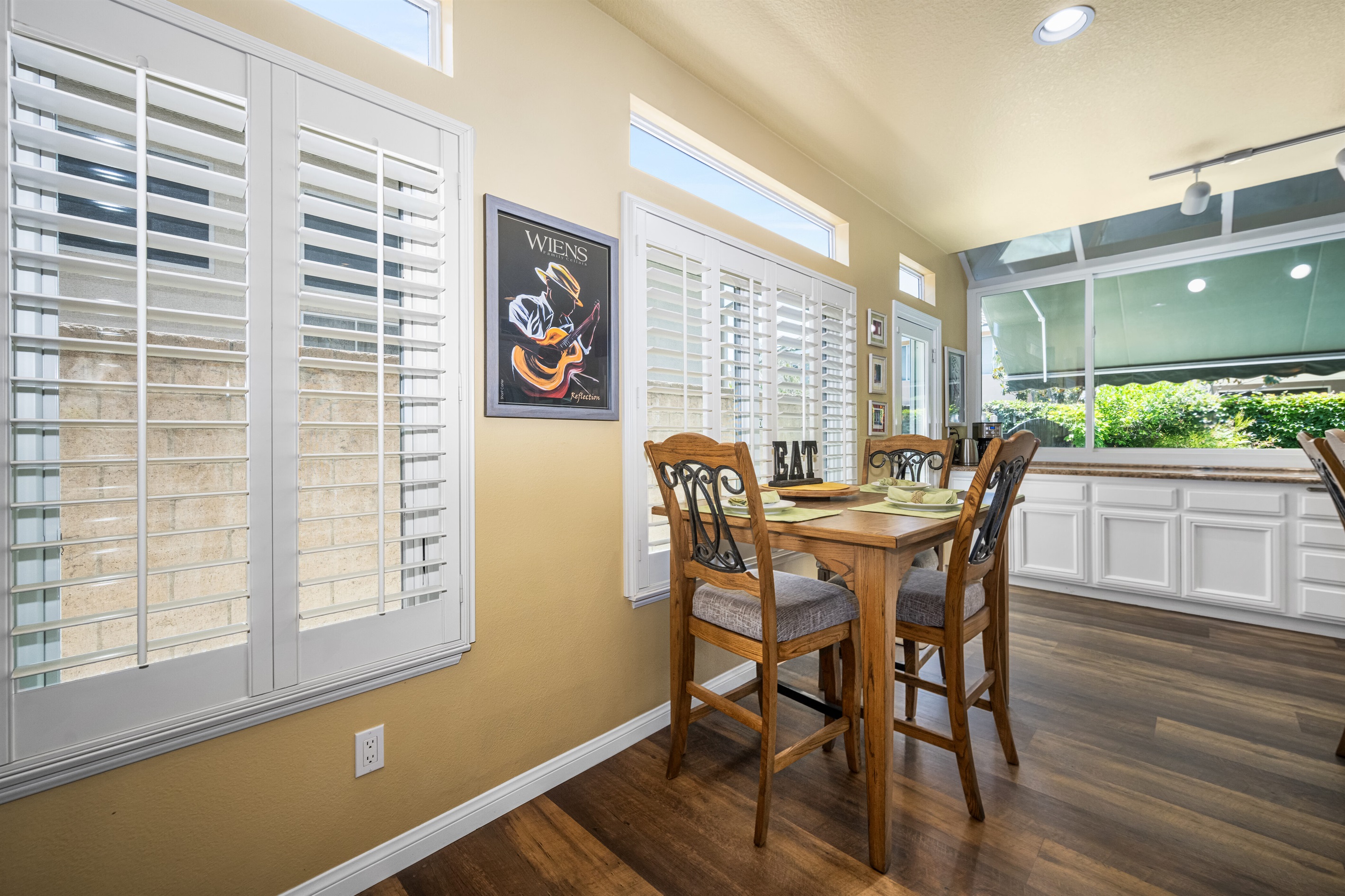 Kitchen table, opens to seat six people
