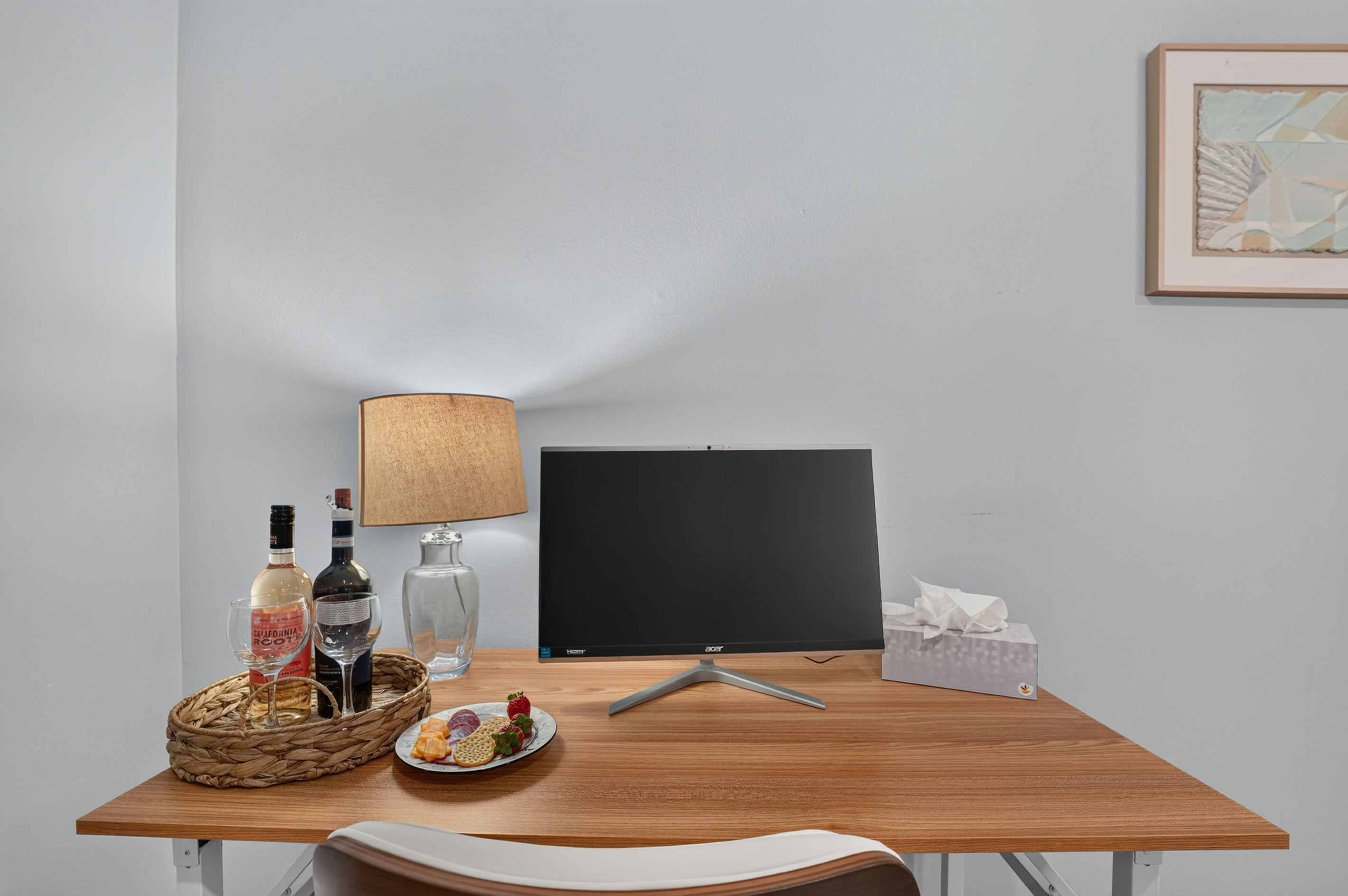 Dedicated workspace with a monitor, perfect for remote work or catching up on emails.