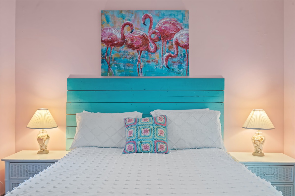 A handcrafted headboard, soft linens, and playful coastal artwork&mdash;designed for restful nights and slow mornings