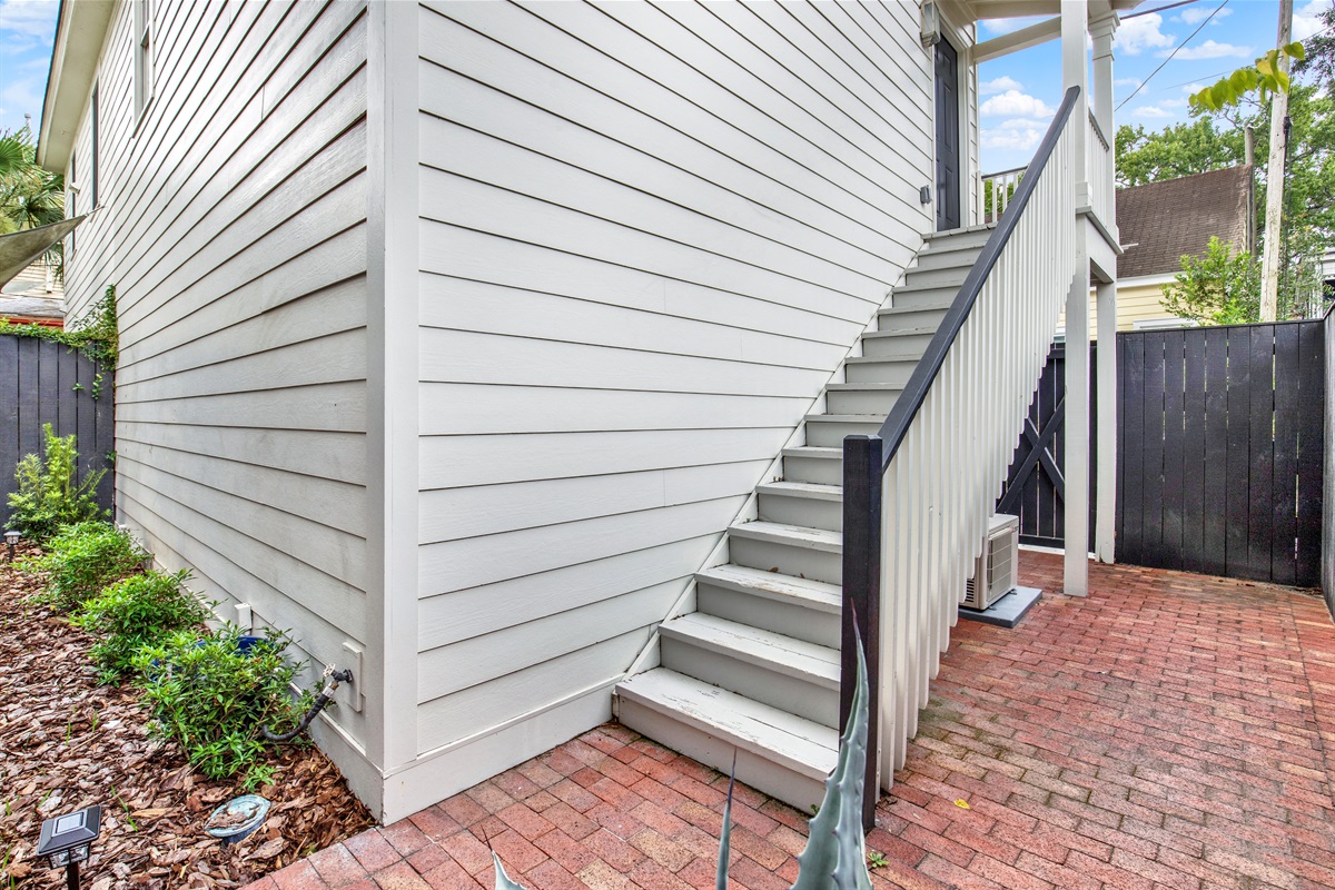 Private exterior stairs lead to your serene second-story escape.