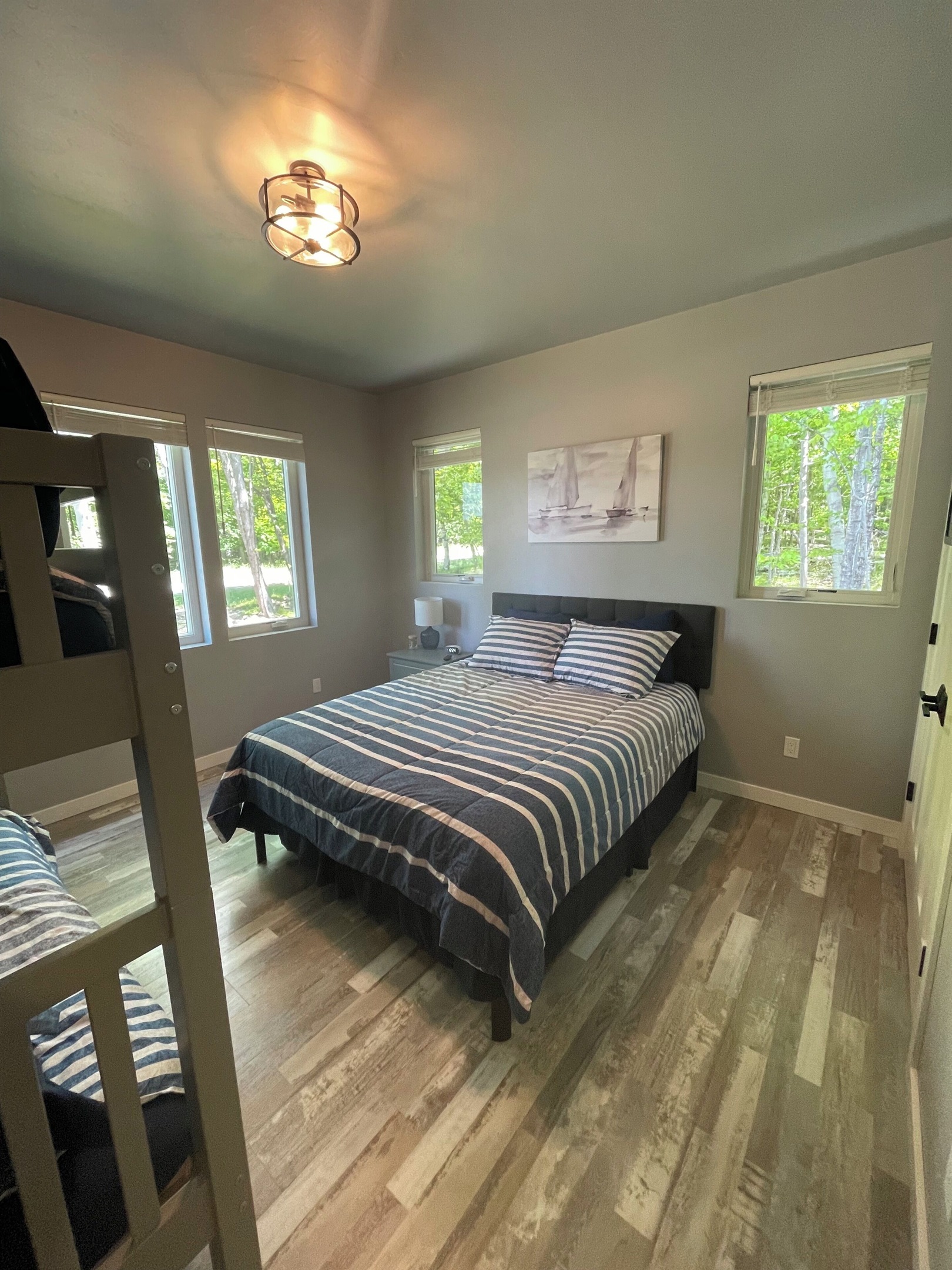 House 1 - bedroom 4 with queen bed and twin bunk beds