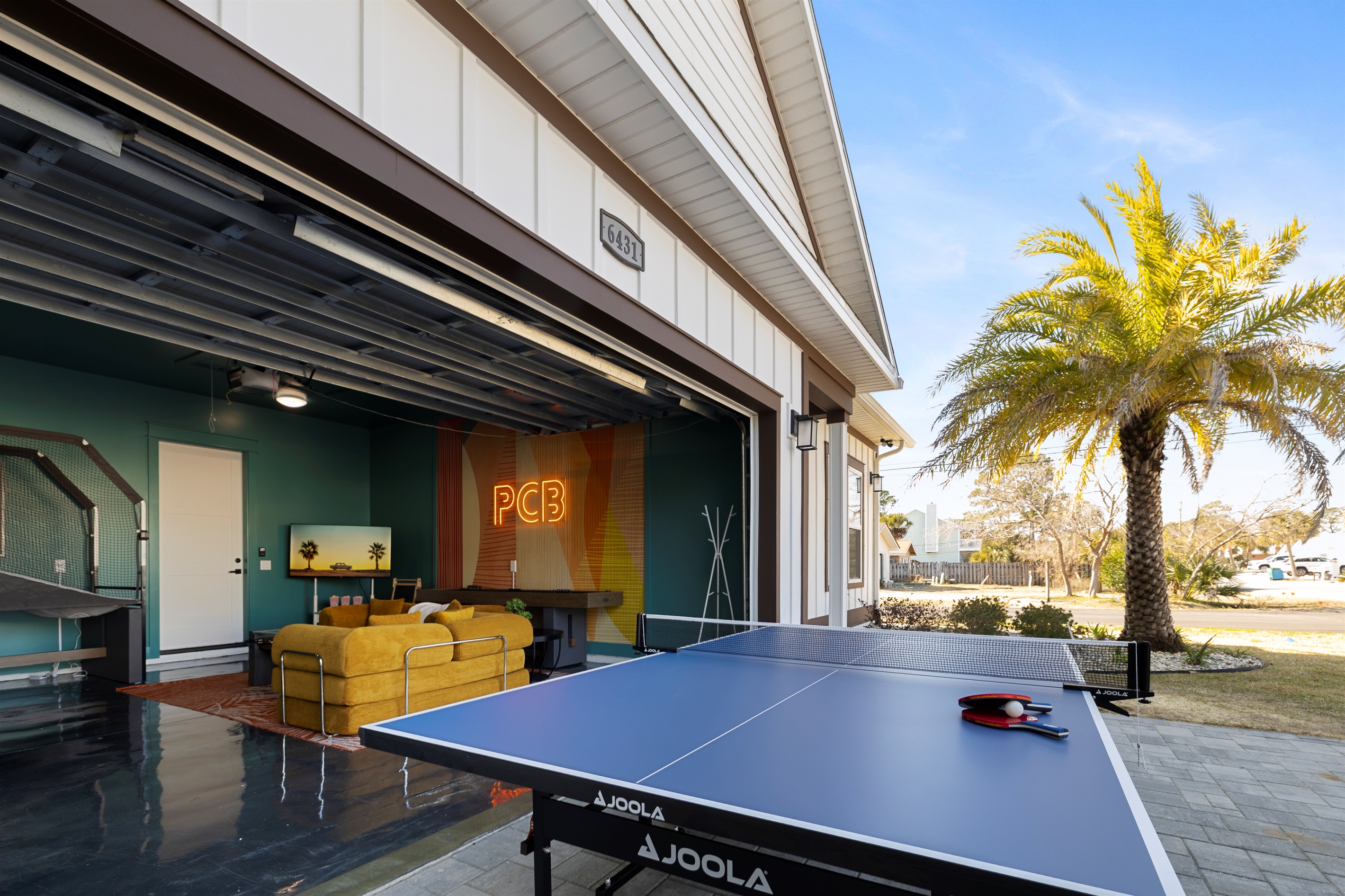Indoor-Outdoor Play – Open the garage door and enjoy ping pong with fresh coastal air flowing in.