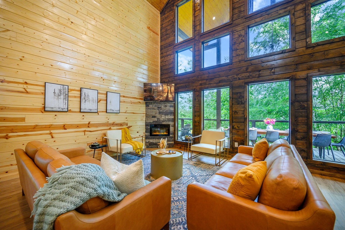 Relax with warm tones and scenic treetop views.