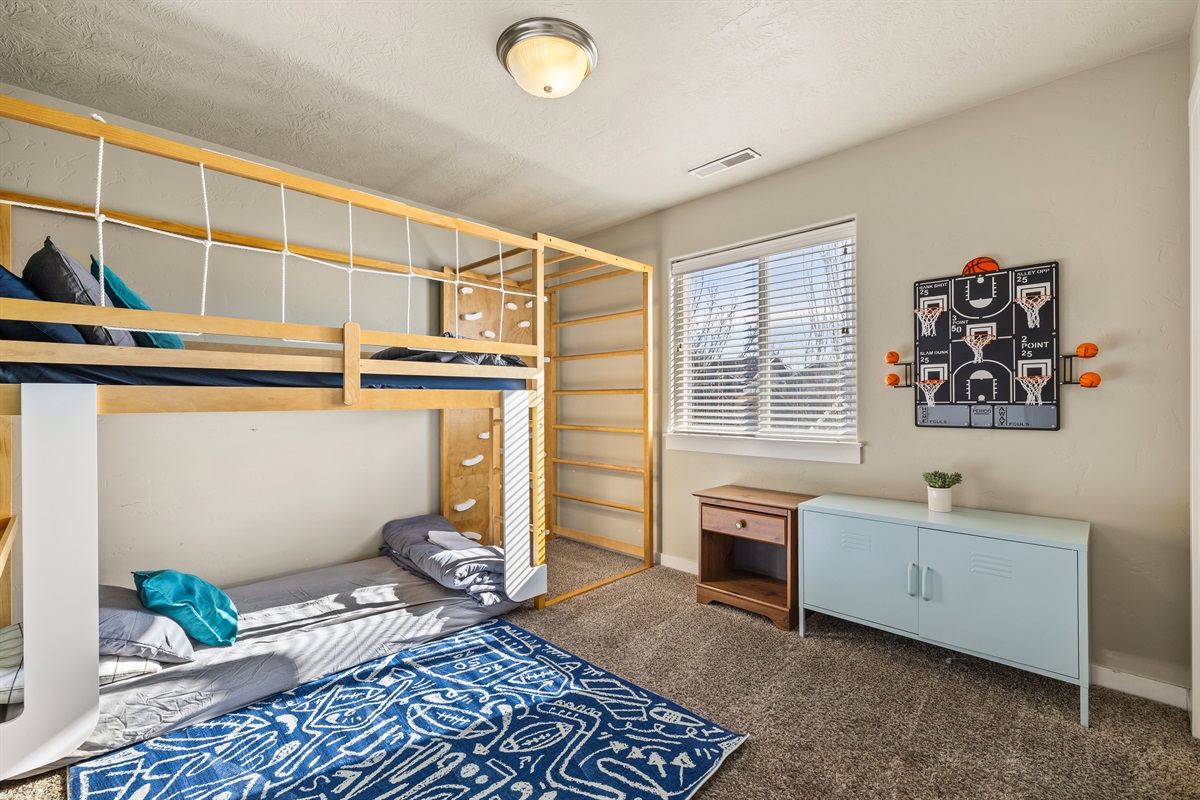Your kids will beg to stay longer in this epic room complete with basketball games, connect 4, climbing and more!