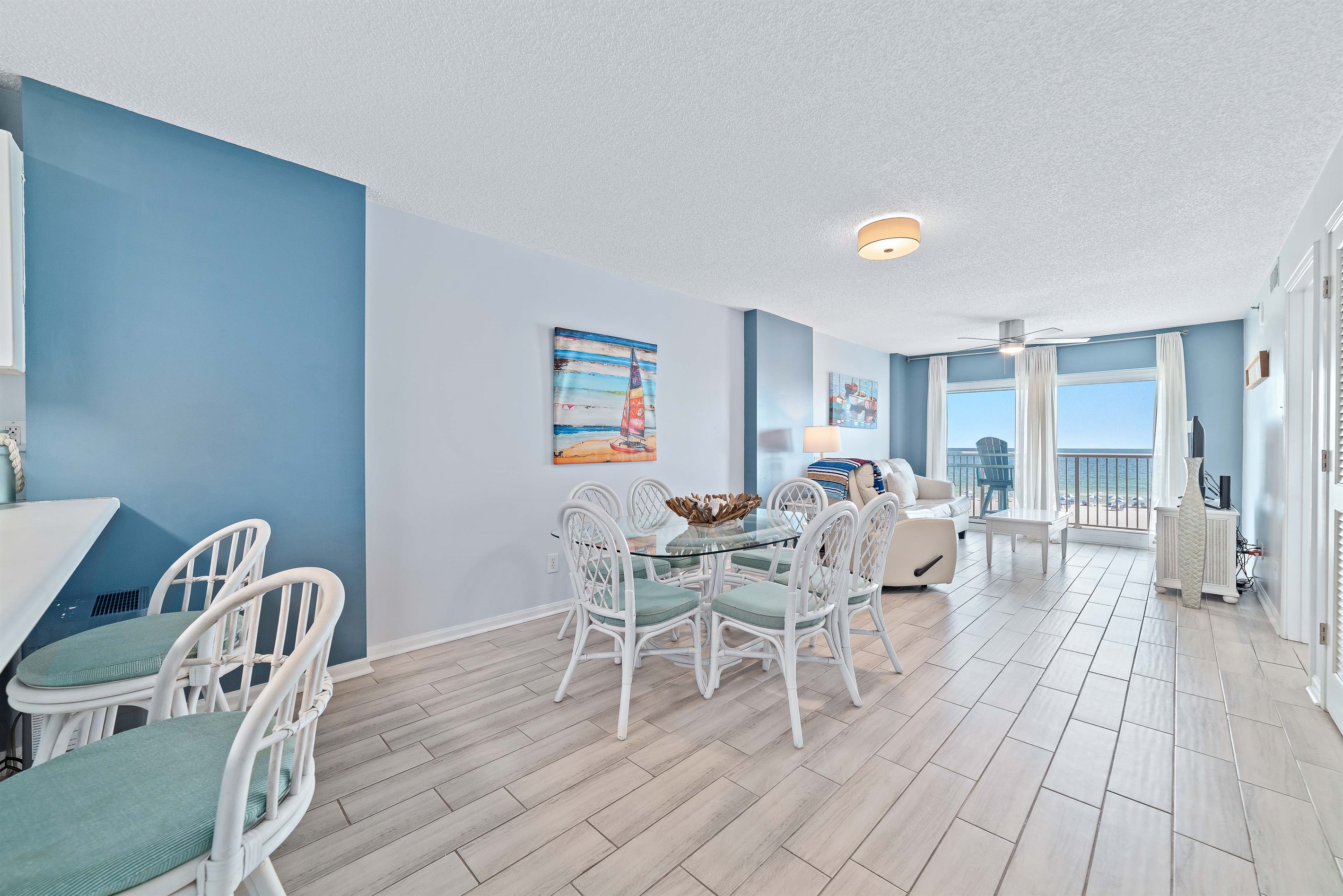 Dine with an ocean vista. This charming dining area offers the ideal setting to savor meals while enjoying breathtaking views of the sparkling coastline.