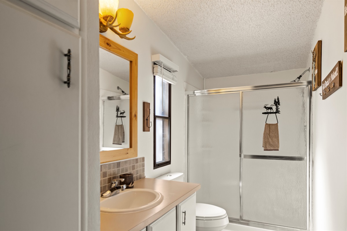 Simple, spotless bathroom with everything you need for your stay.