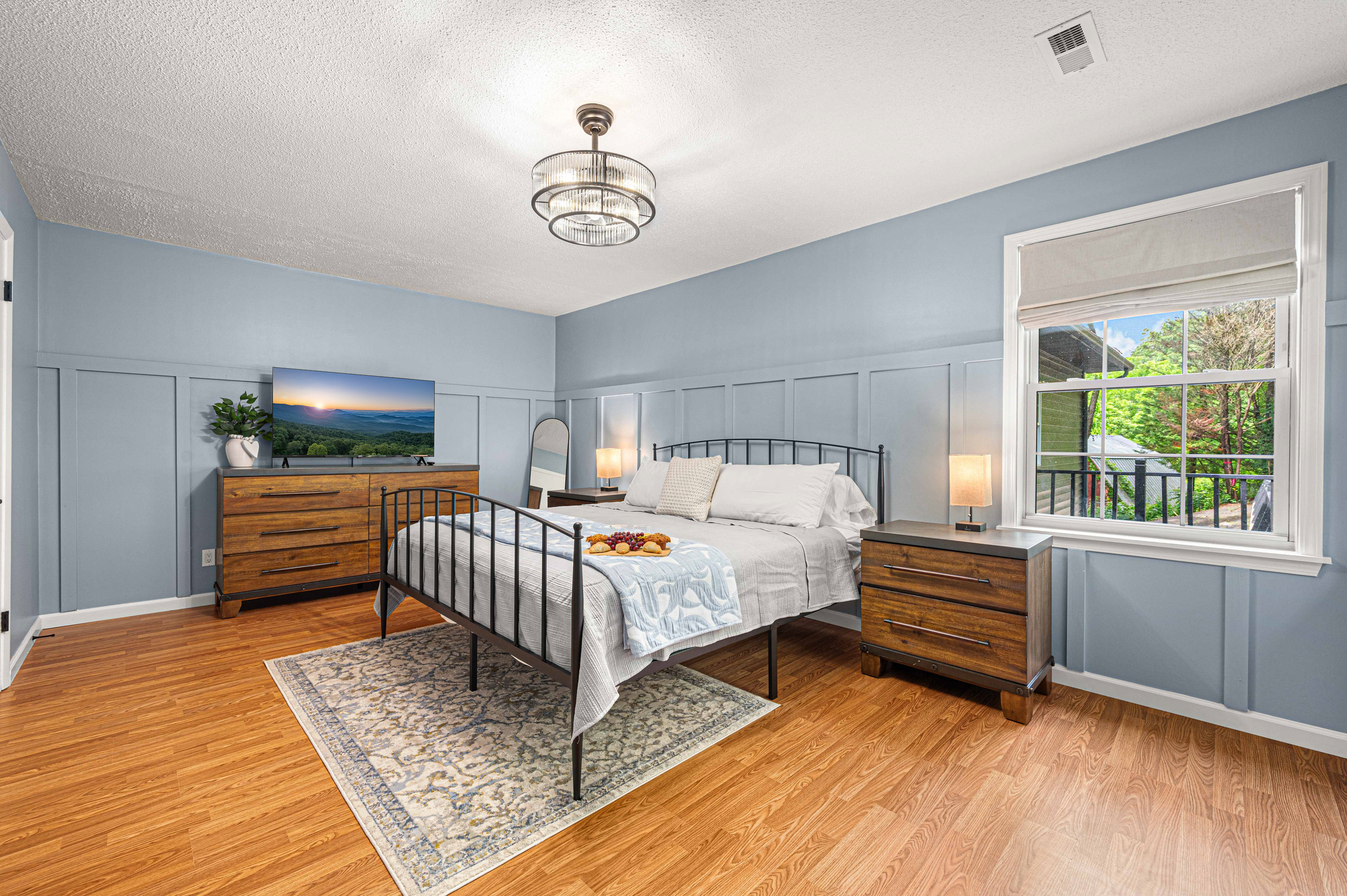 Bedroom Retreat: Unwind in stylish comfort with nature views and modern decor. Perfect for relaxation!