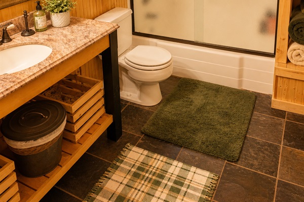 The upstairs loft area has it's own full bathroom with bathtub/shower combo.  It will be stocked with towels, hair dryer and basic toiletries as well.