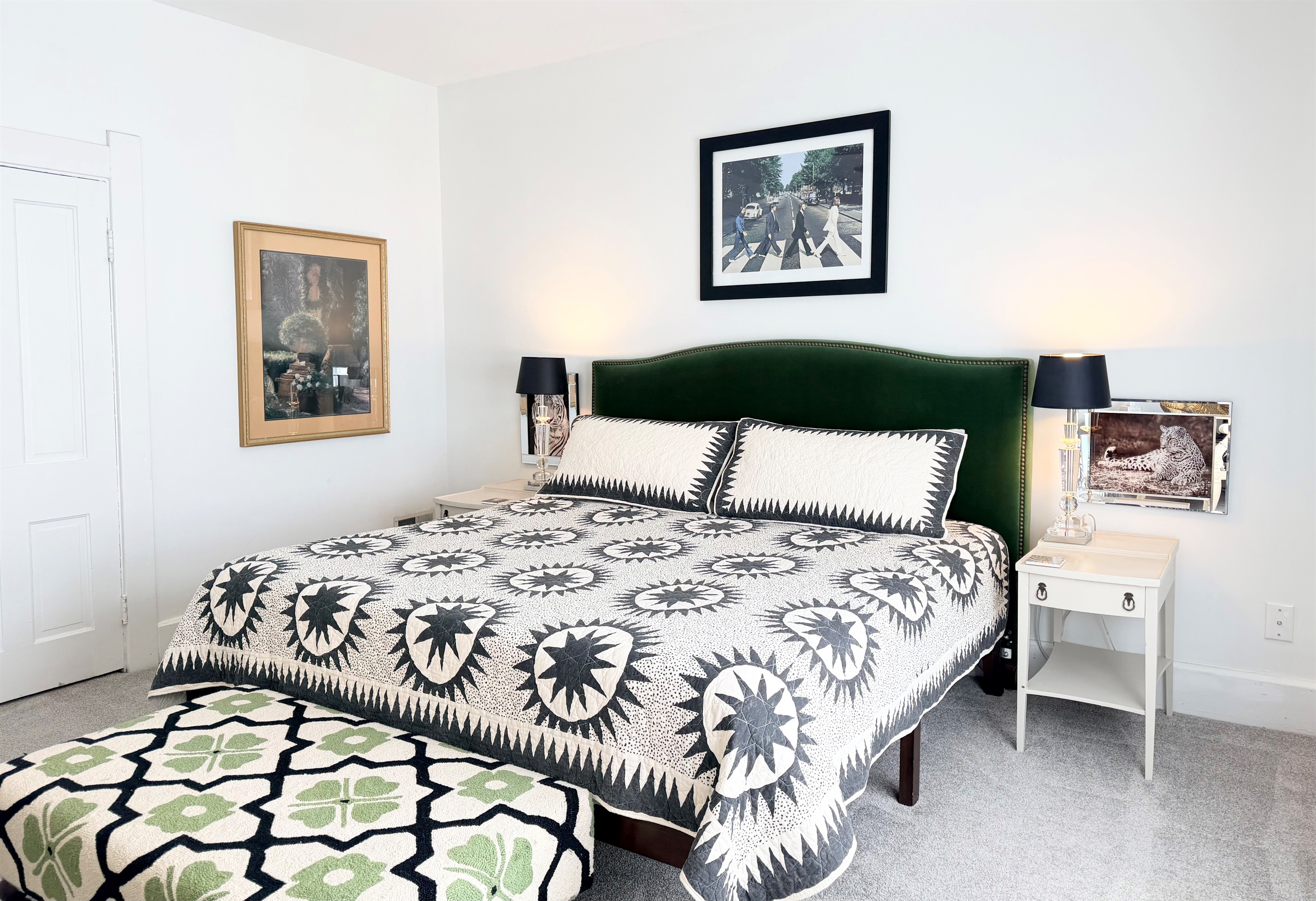 Spacious king bedroom with ceiling fan and evening-ready details with soft bedside lighting & layered textures — quiet, calming, and thoughtfully styled.

