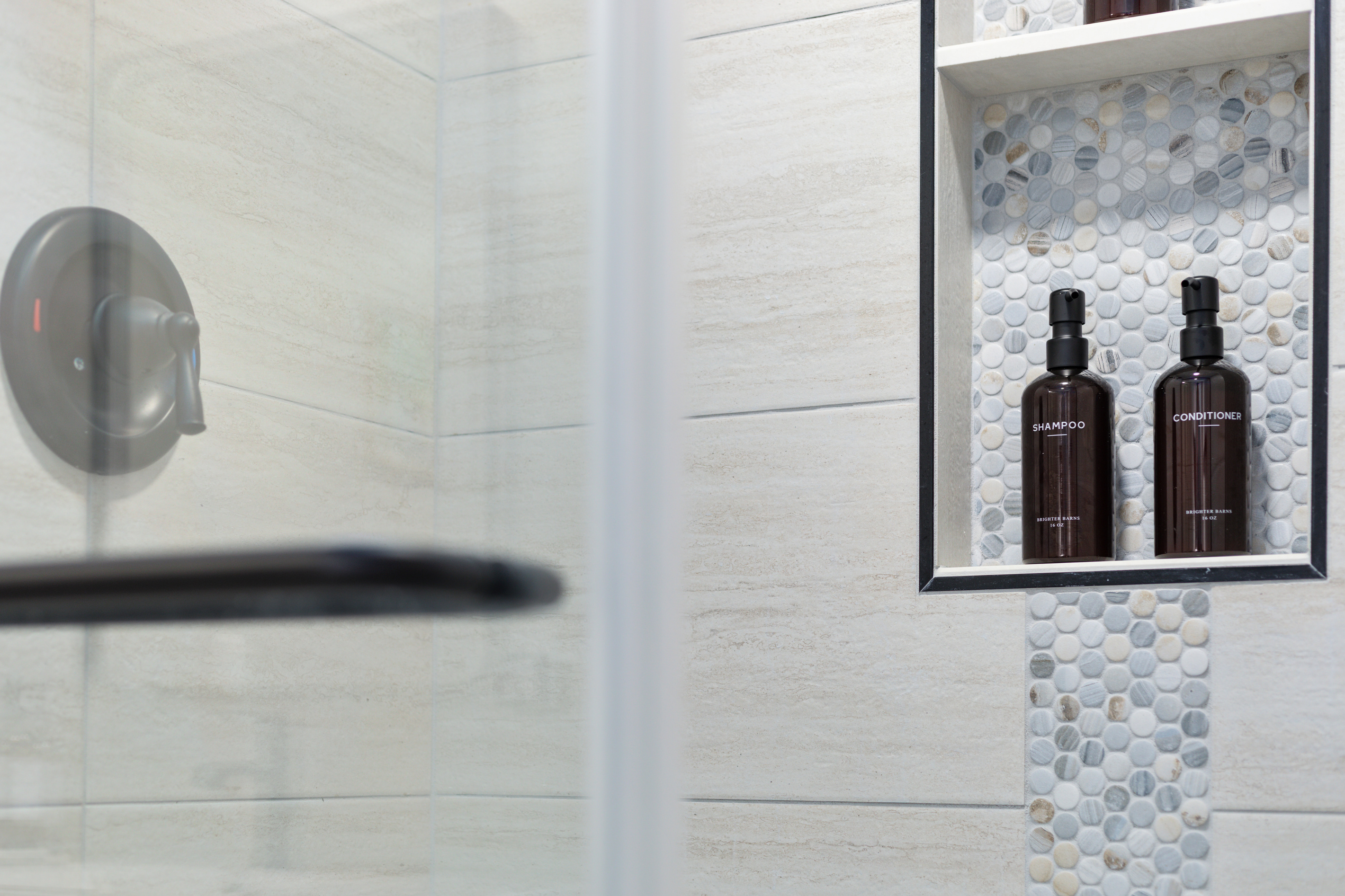 Step into the walk-in shower and let the day wash away — stocked and ready to help you unwind.