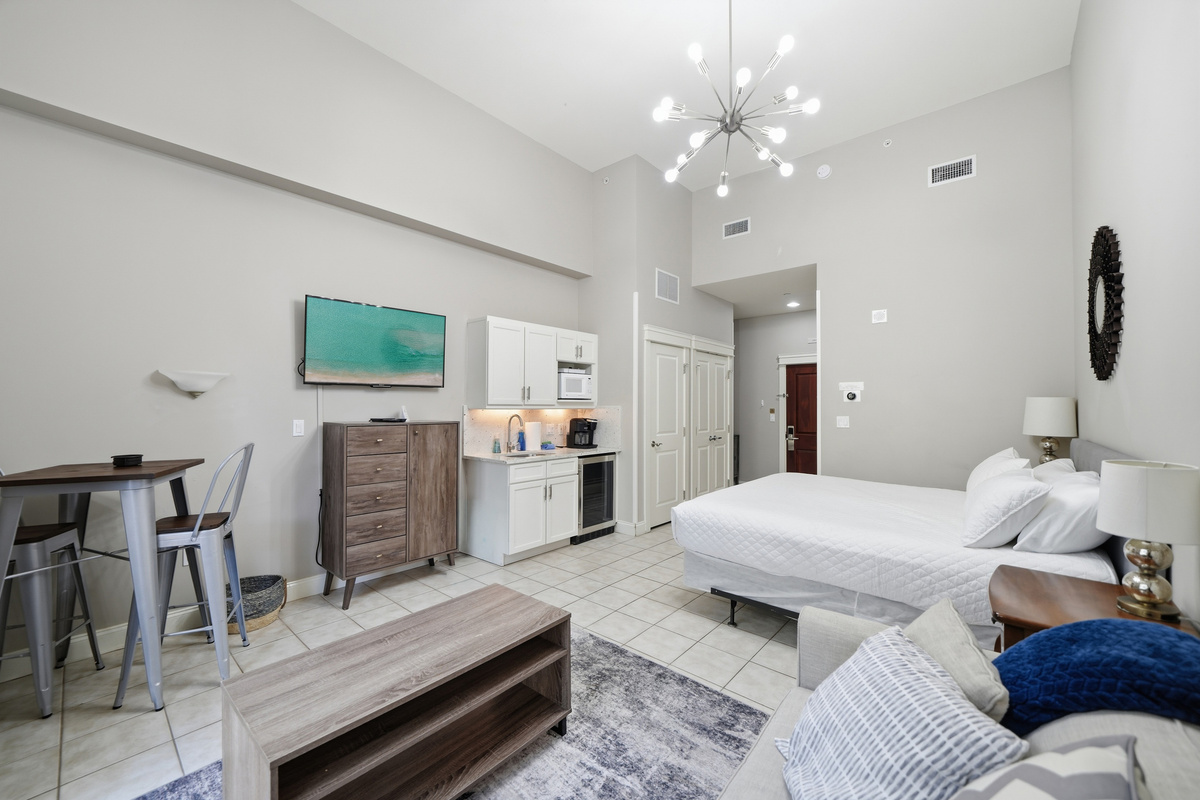 Our mounted smart TV is viewable from both the king-size mattress and queen-size sleeper sofa.