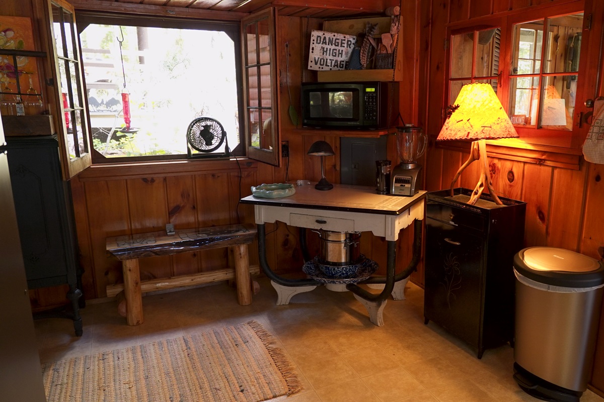 Kitchen also includes microwave, coffee maker, etc.