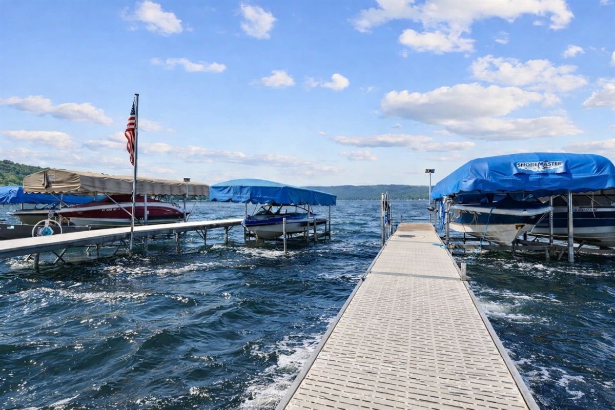 Relax by the serene dock and enjoy stunning Honeoye Lake views. Perfect for boating and water activities. ️☀️