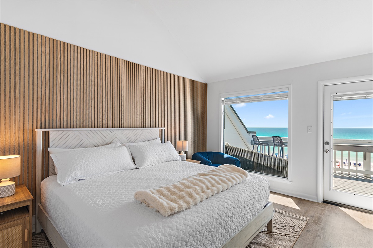 3rd Floor - Bedroom 1: Master Bedroom with King bed, Gulf Views, ensuite Remodeled Bathroom with Gulf View soaker tub and walk in shower, Private Balcony, Smart TV