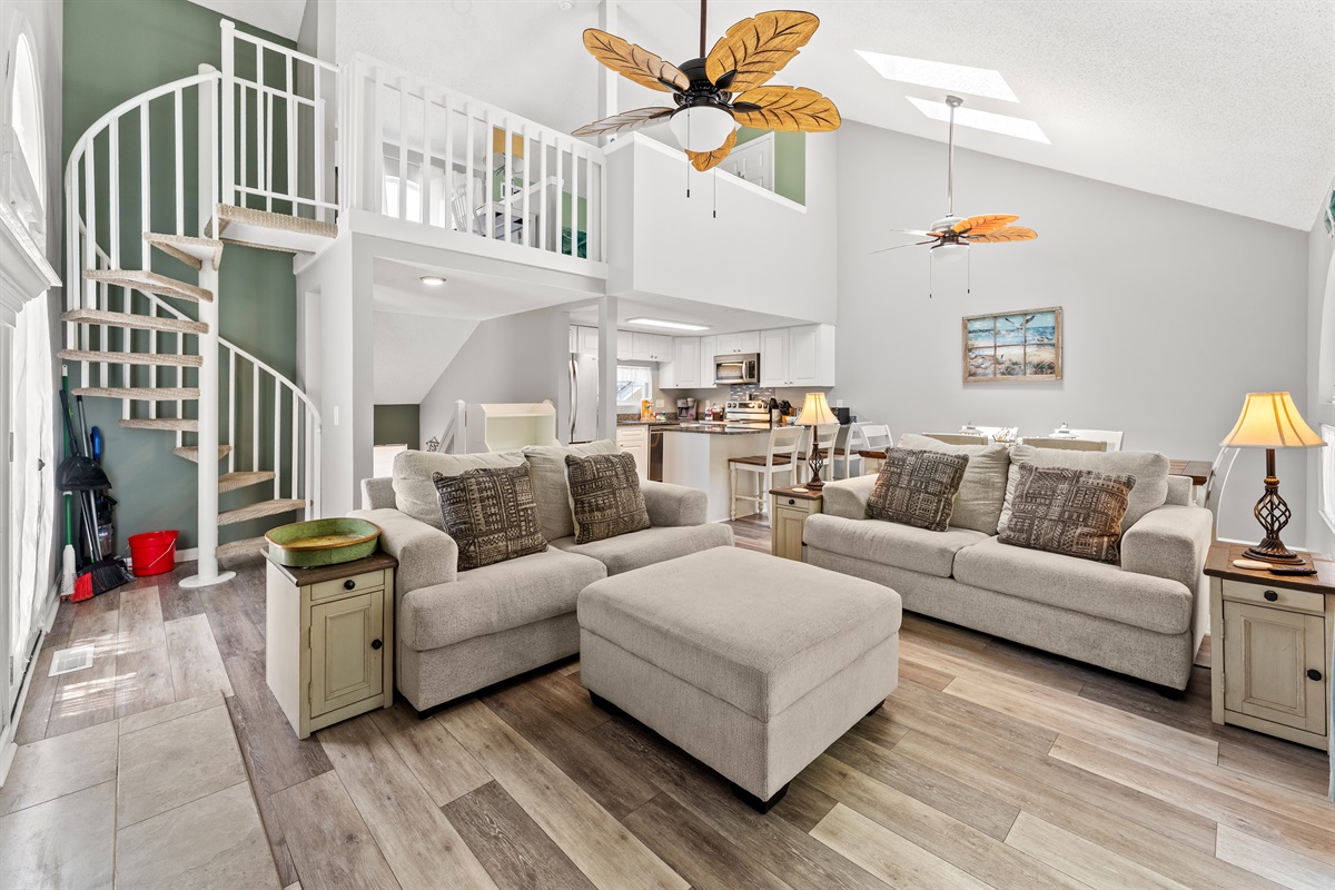 Lovely large living room area with access to the balcony