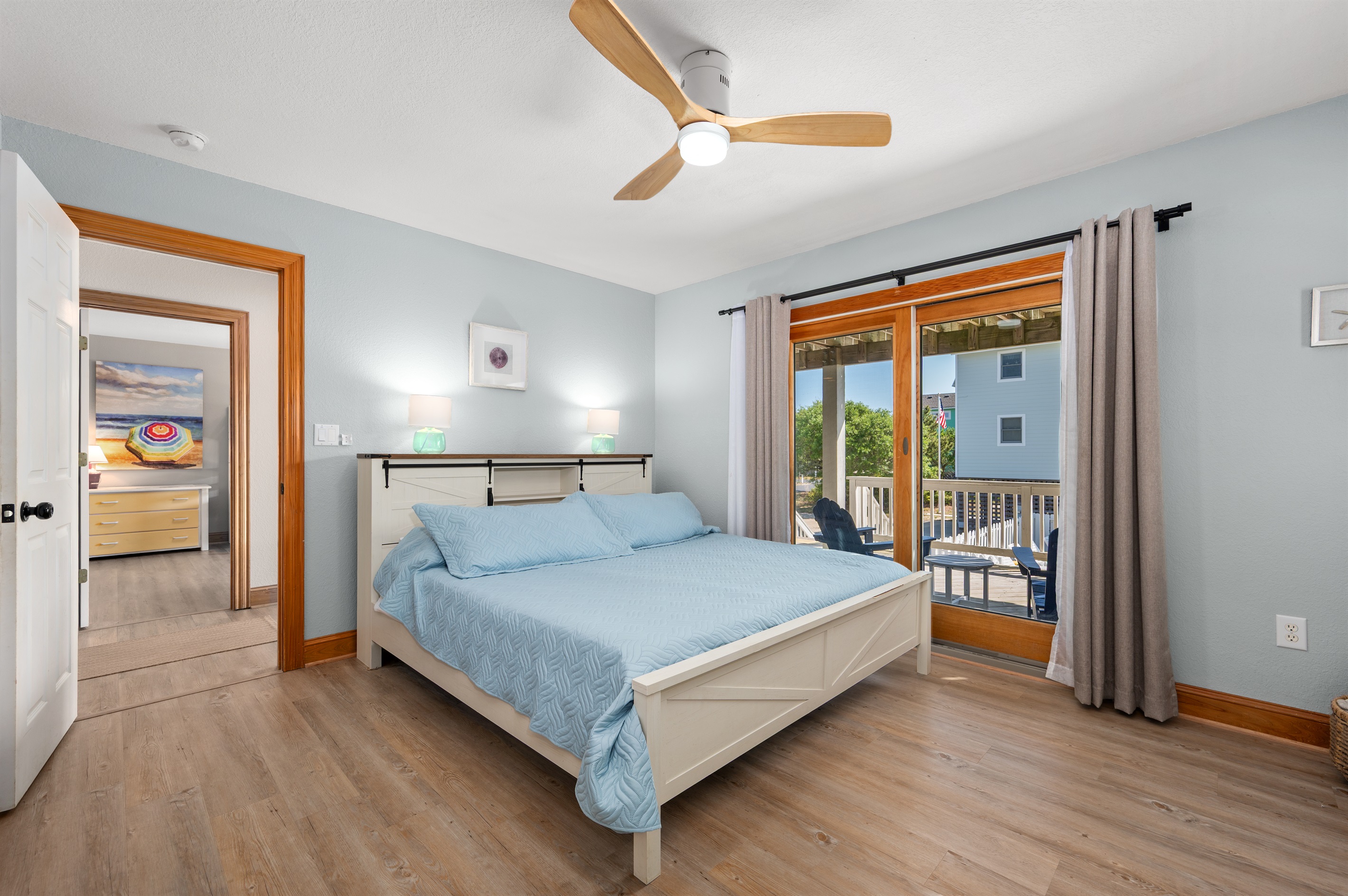 Wake up to natural light and step right out onto the deck from this spacious king bedroom.