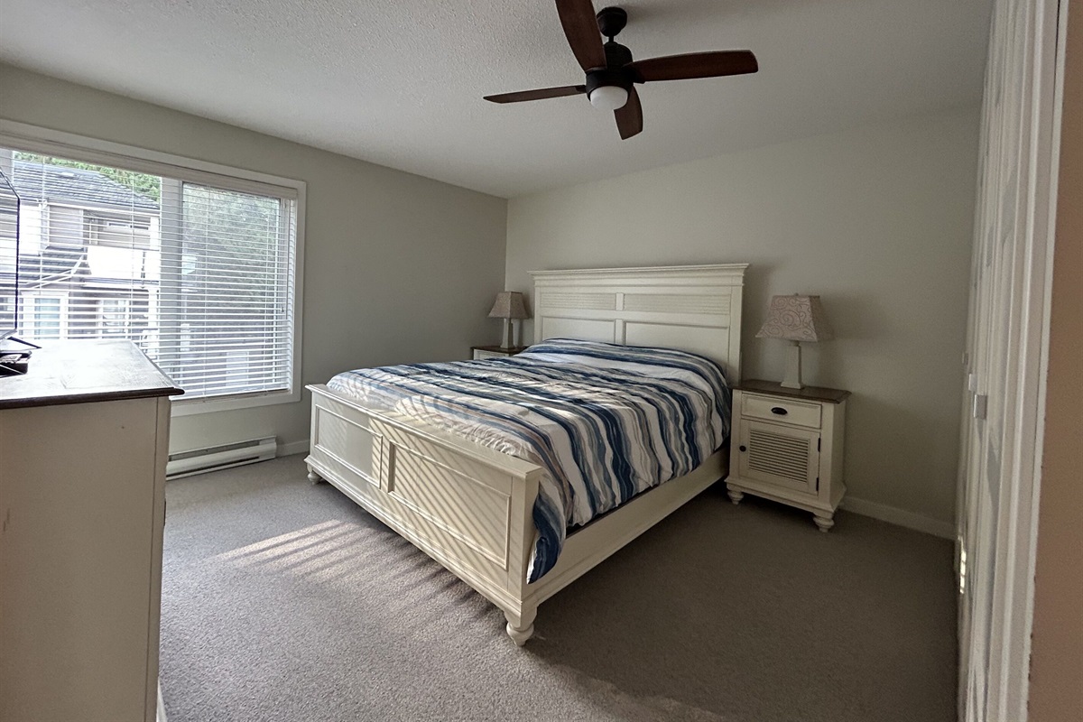 Master bedroom with ensuite & TV