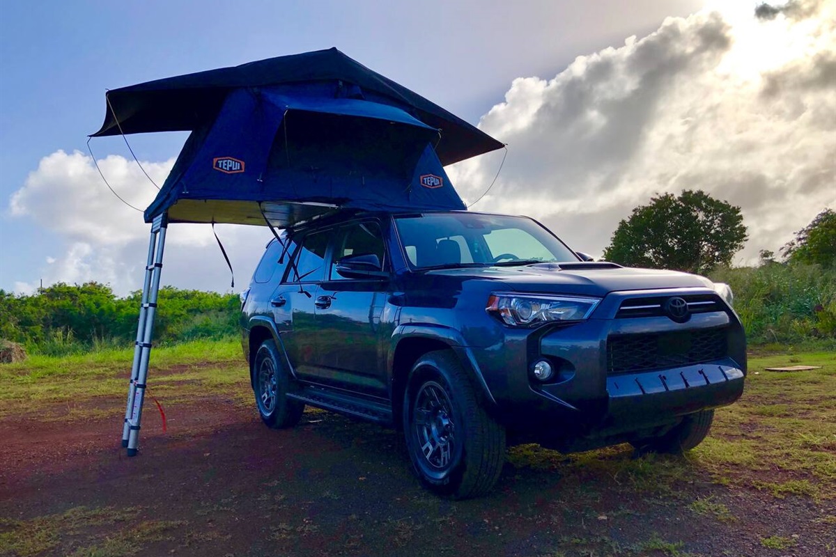 Black Toyota 4Runner rooftop camper rental on Kauai