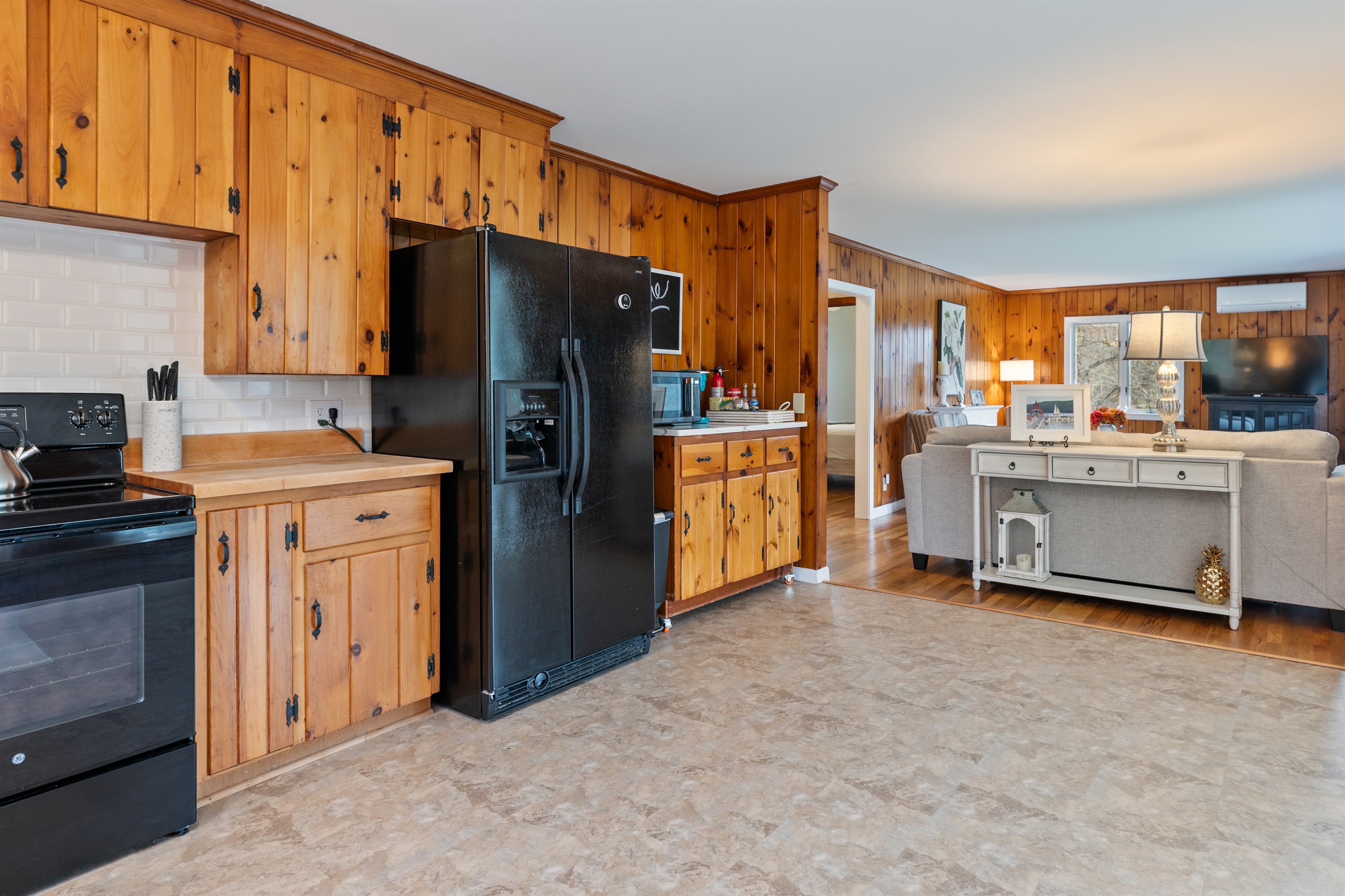 Spacious kitchen extending to the living room