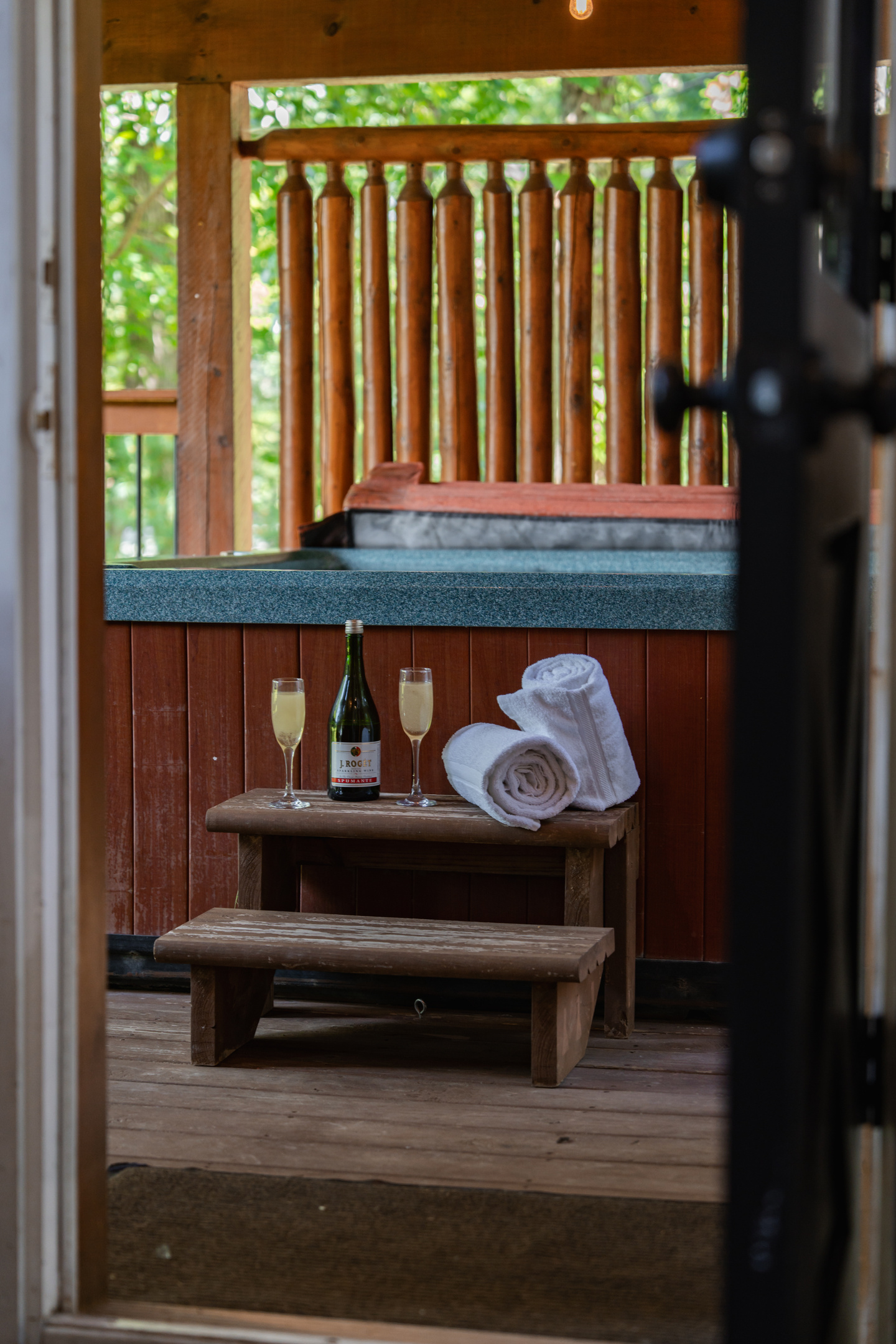 Covered deck hot tub means a relaxing soak no matter what the weather.