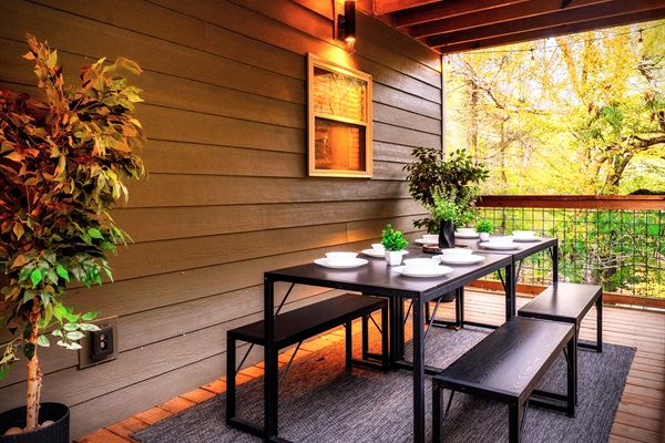 Any meal will taste better when enjoyed outdoors by the deck beside the calm & flowing river beneath you.