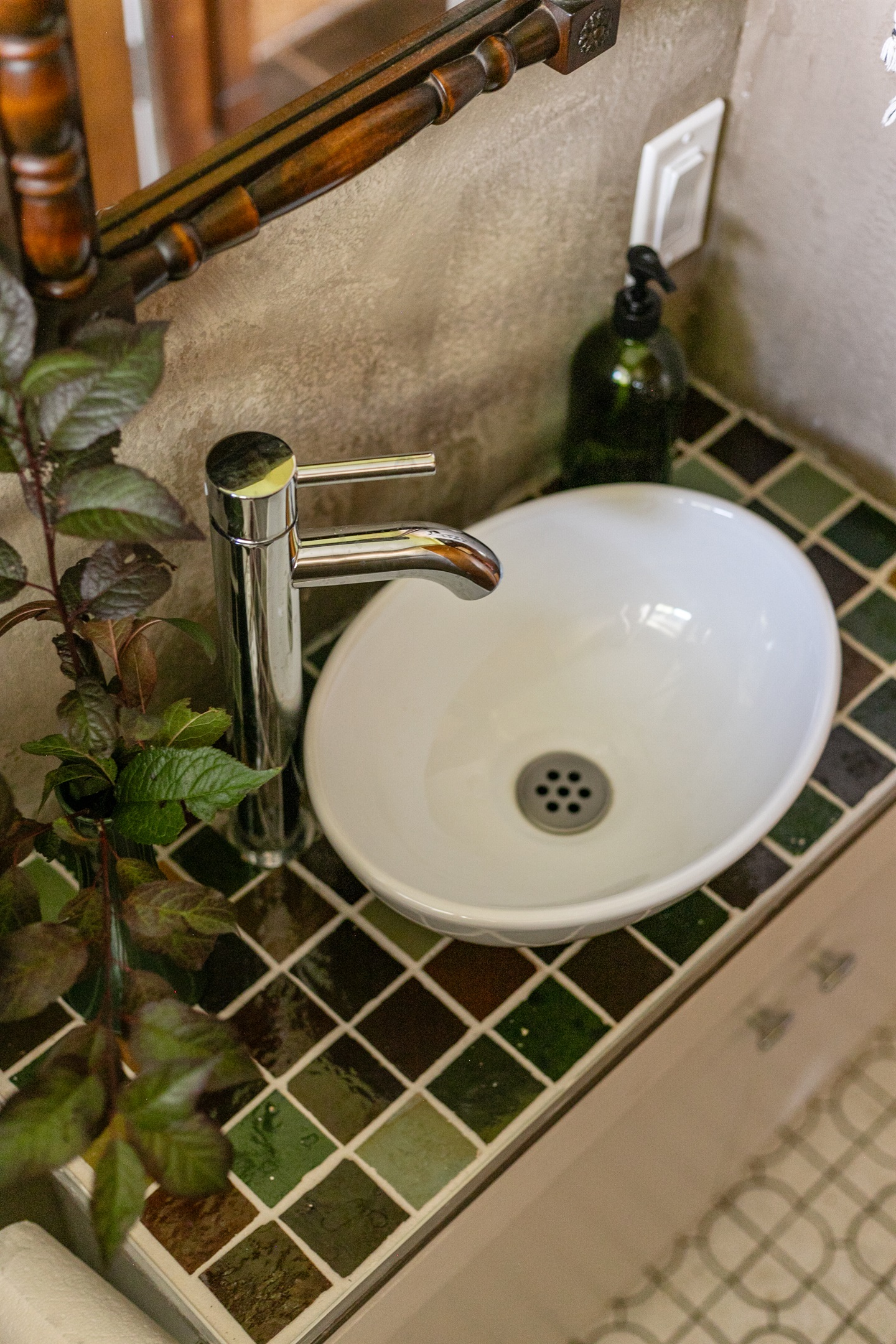 Modern finishes and simple touches make the main level half bath both stylish and convenient.