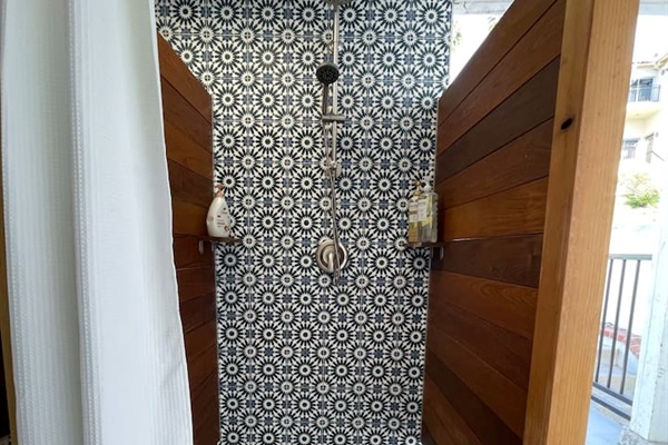 Outdoor showers feel luxurious with softened water and fresh air.  Plenty wide for a wheelchair.