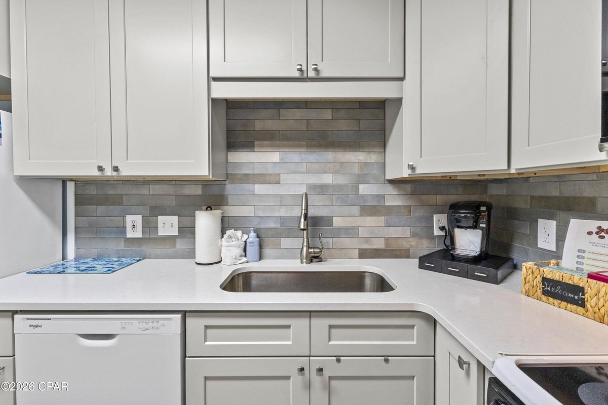 Fully refreshed kitchen with brand-new cabinets and stocked kitchen with tons of cooking utensils, cookware, and everything you need to prepare meals.