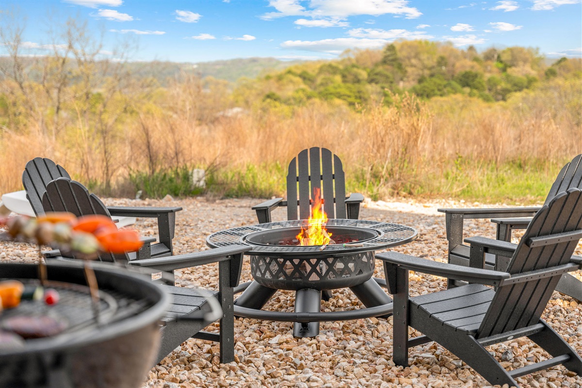 Relax around the firepit with Adirondack seating and enjoy the peaceful Ozark views.