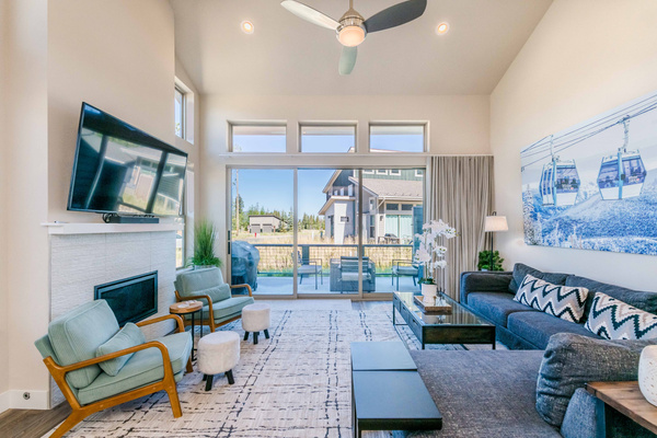 Living Room-  sliding glass door seamlessly connects the indoor space to the outdoor patio