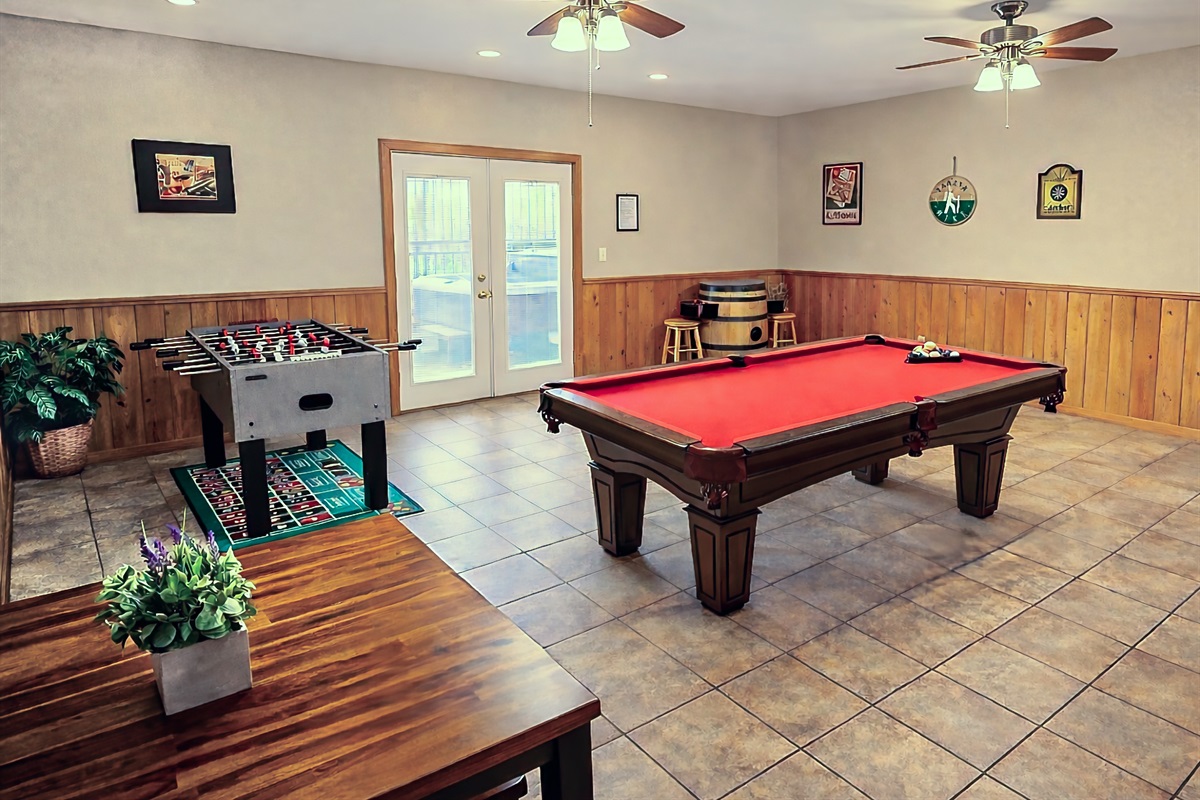 In the game room, you can find a billiards table, video arcade system, foosball, large HDTV, and a pub table perfect for card & board games.