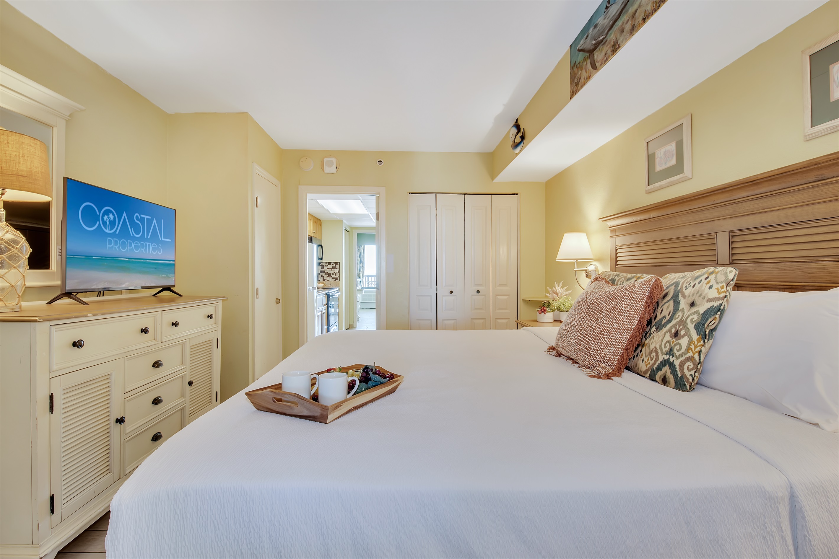 Relax in comfort with soft linens and a calm coastal vibe