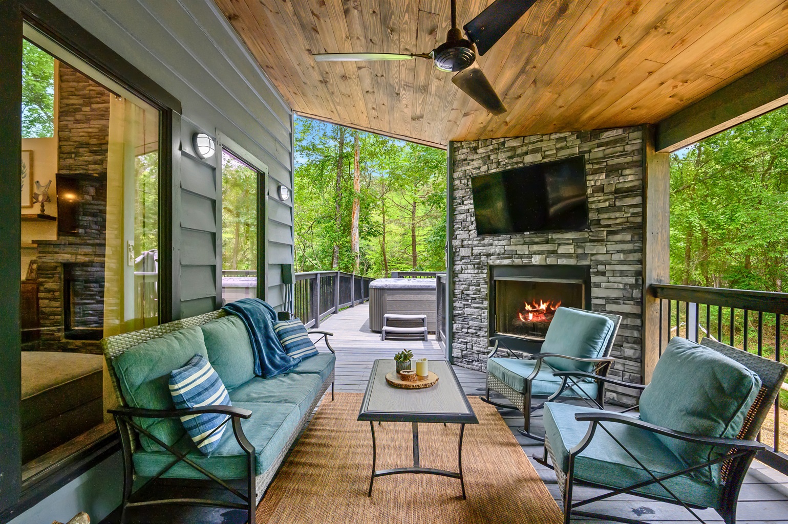 Sip, chat, and unwind in the open-air living room with forest views and fresh mountain air.