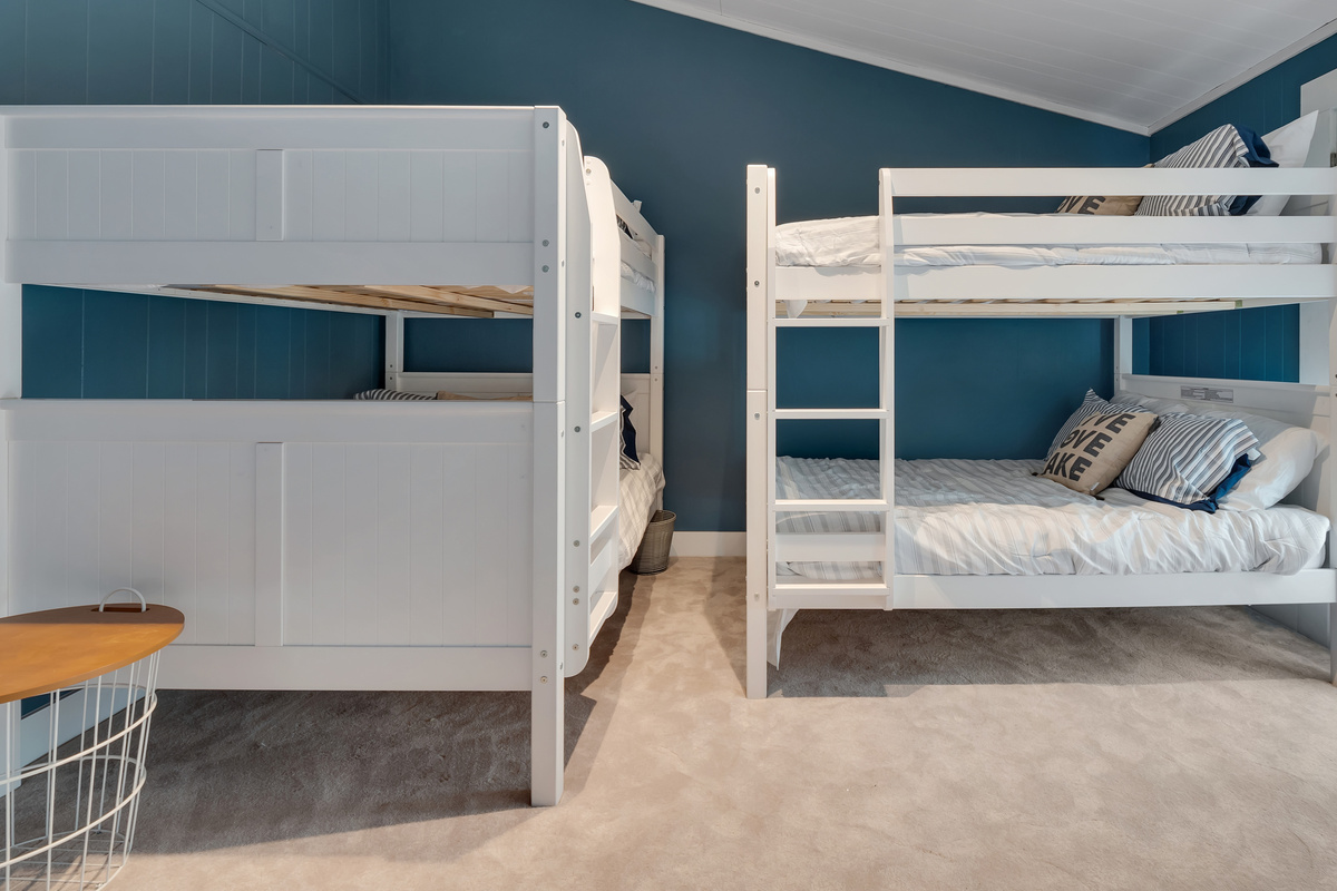 Upstairs, two full-over-full bunkbeds, plenty of space.  Patio over front yard.