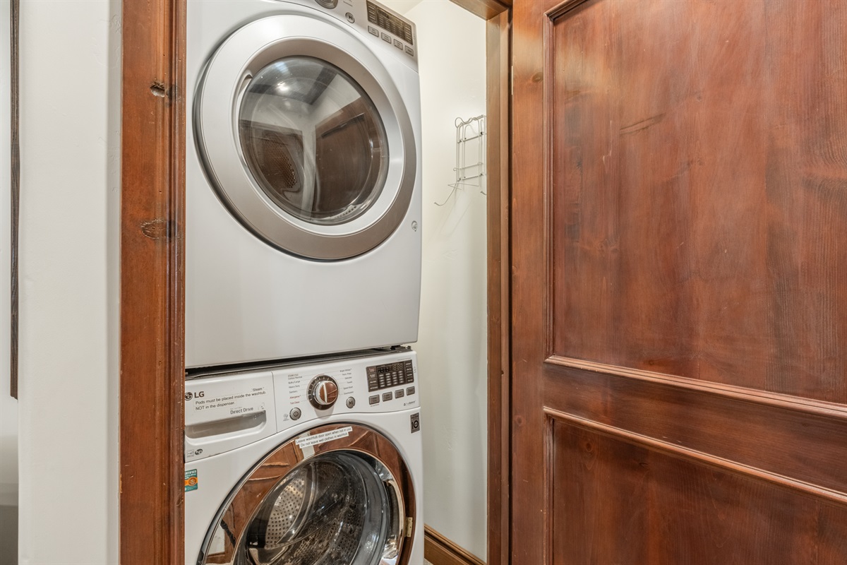 Stacked full-sized washer and dryer are available. We'll even provide soap pods.