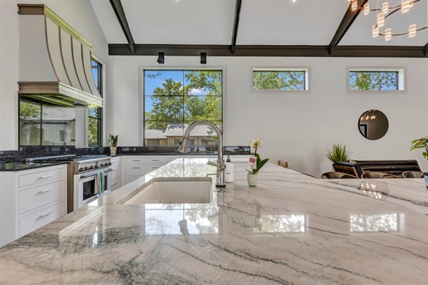 From the touch-activated faucets to the dedicated butler's pantry, this  kitchen has it all!