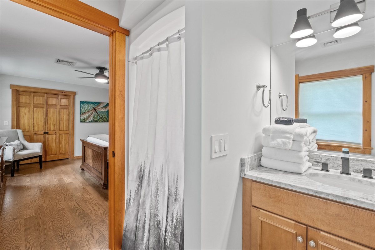 Bathroom for second floor ensuite bedroom with queen bed and bunk bed