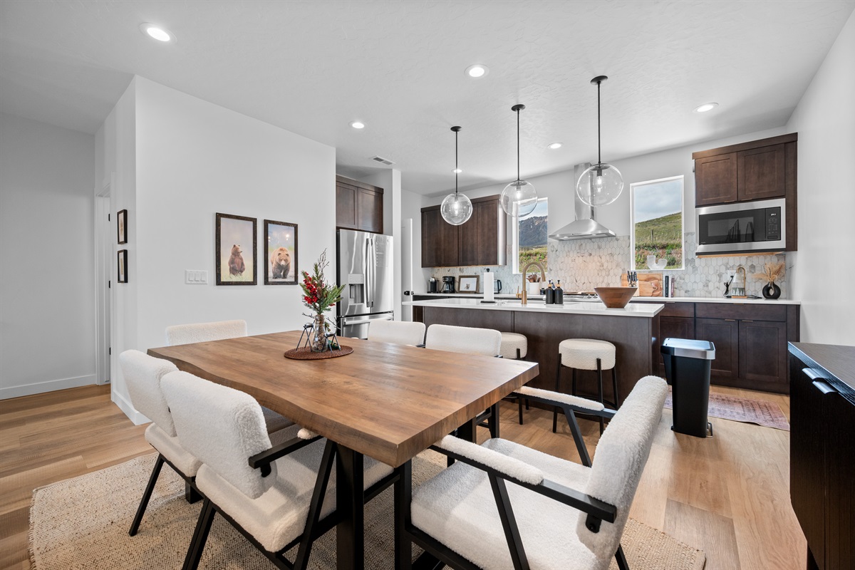 Dining table with seating for gathering and shared meals.