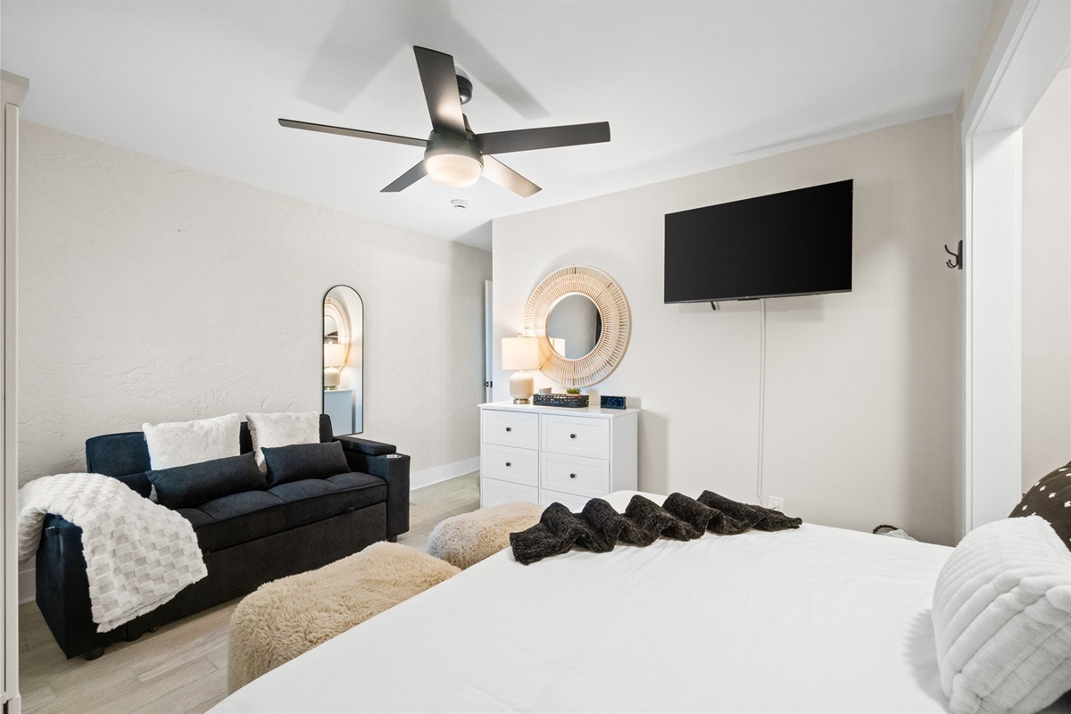 bedroom with sleeper sofa to provide many options for sleeping