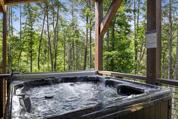 The soothing hot tub offers a calming escape, perfect for unwinding and relaxing.