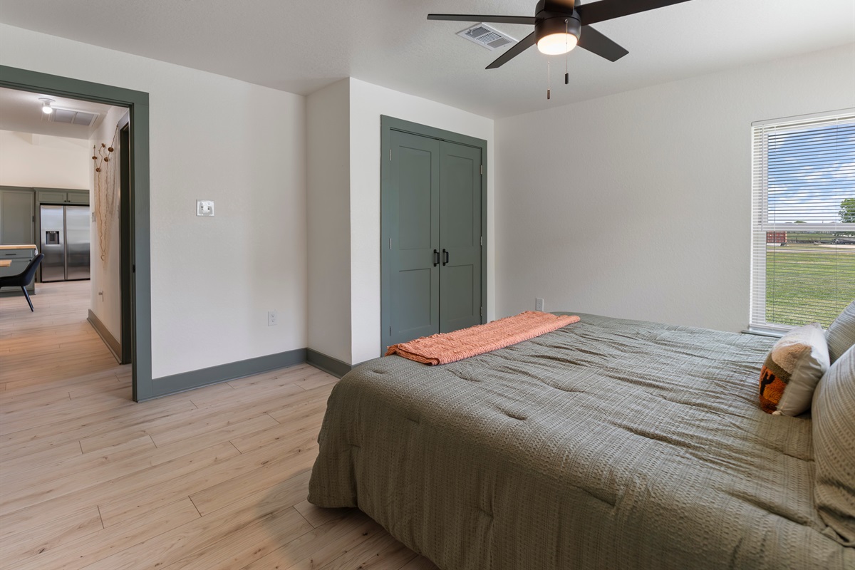 Primary Bedroom with a king size bed and ensuite bathroom