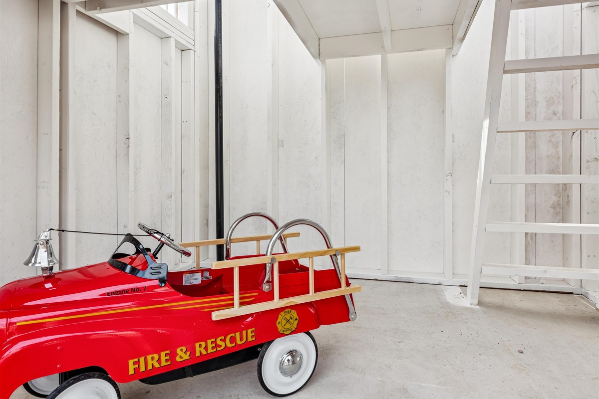 Your family will spend hours playing in thei unique backyard fire station!