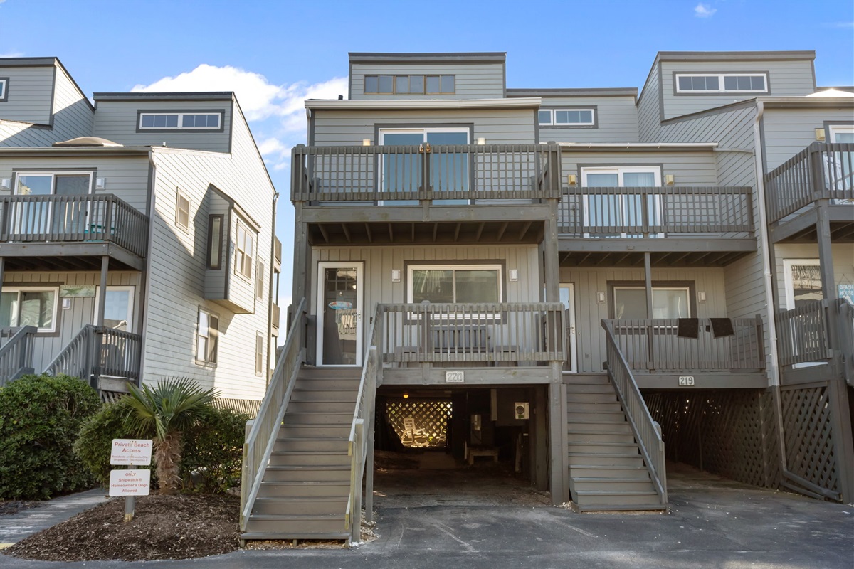 The front of our home, featuring multiple private balconies and easy access just steps from the beach