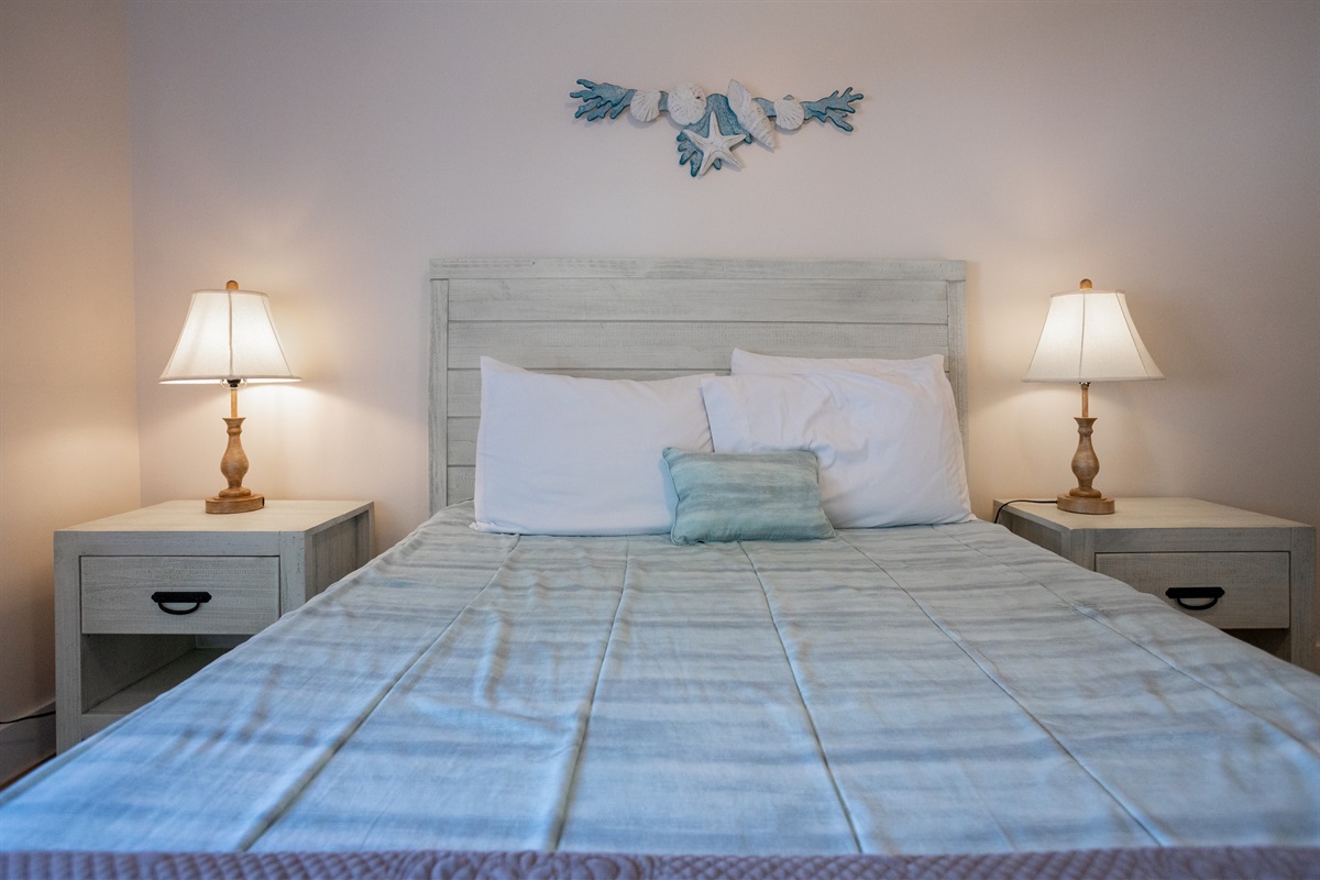 Thoughtful touches make this bedroom both functional and welcoming.