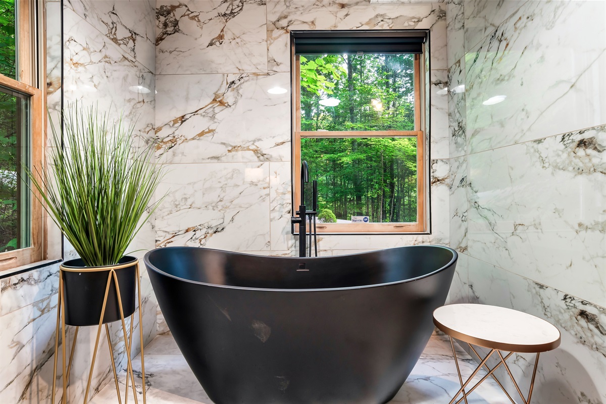 Unique soaker tub with luxury Tile giving you a sense of tranquility