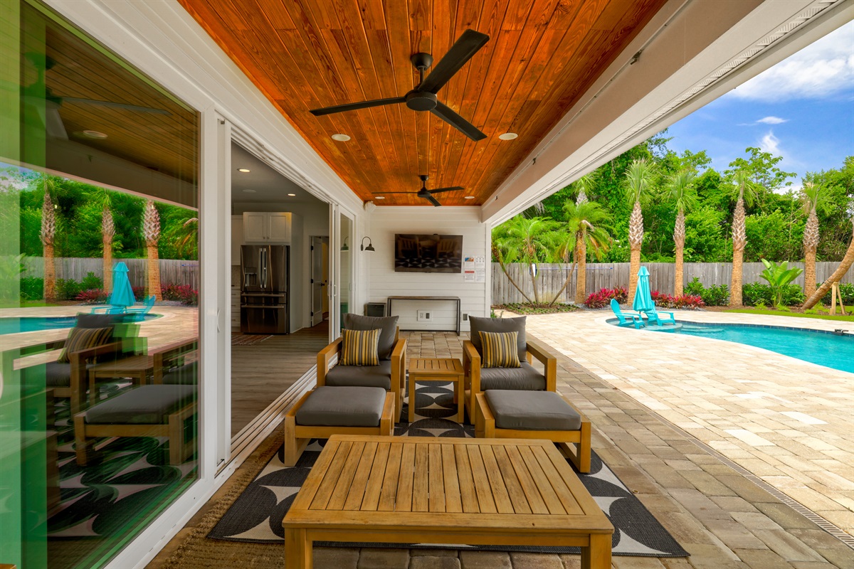 Covered patio perfect spot for outdoor meals and conversation