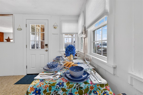 A simple, welcoming table for four where moments are shared easily.
