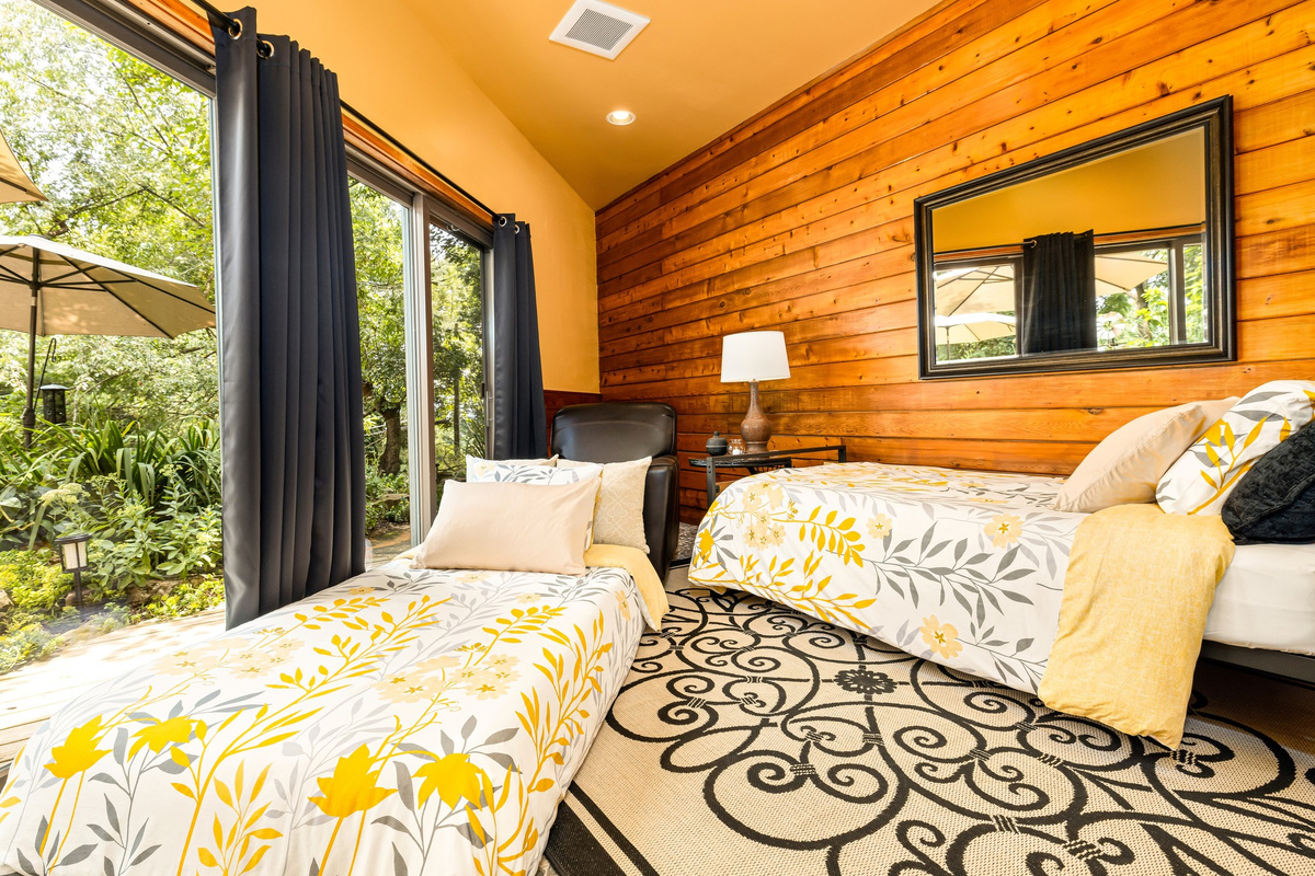 Whether lounging on the daybed/trundle in its 'closed' position, or getting a great night of sleep on the memory foam twins, you can enjoy pond sounds and fresh air with the doors open.